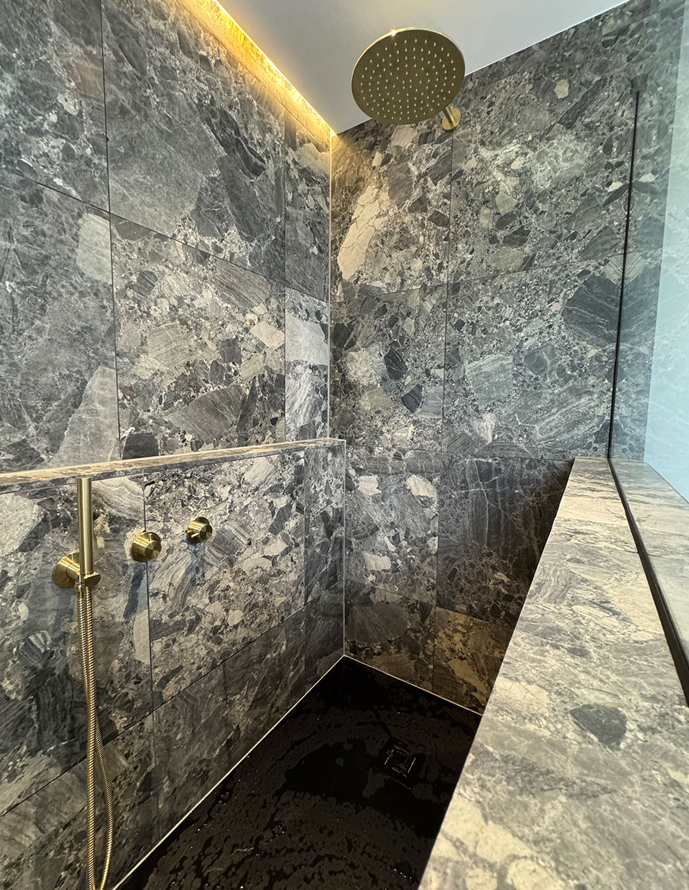 A marble bathroom by Professional Polish Builders in Croydon & South London